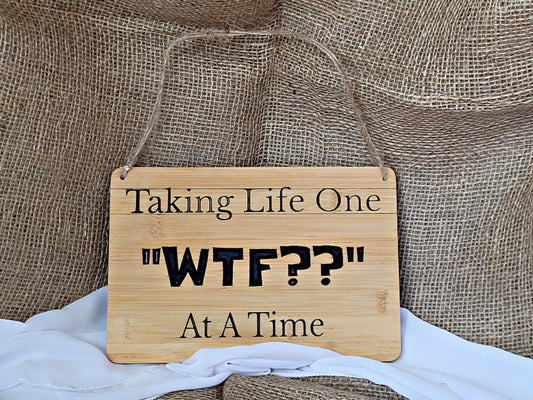 One wtf at a time sign